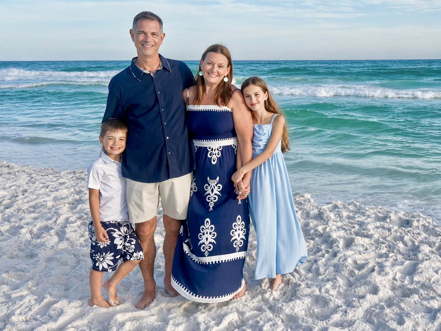 Rebecca Gugeler, Clinic Director at My Higher Healing in Southlake, TX, with her husband and two children